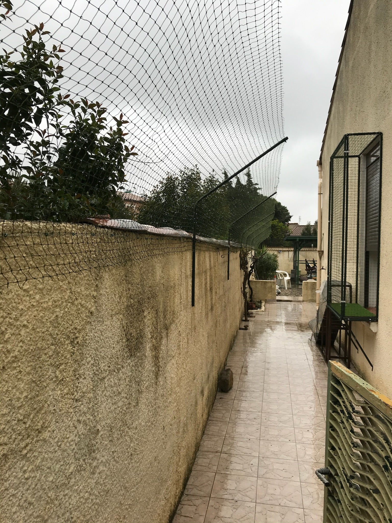 Bavolet anti-fugue sur muret terrasse