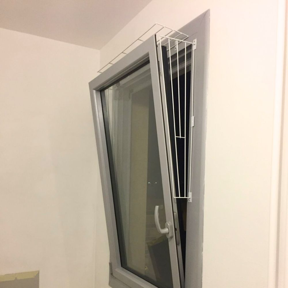 Grille protection fenêtre oscillo-battant pour chat